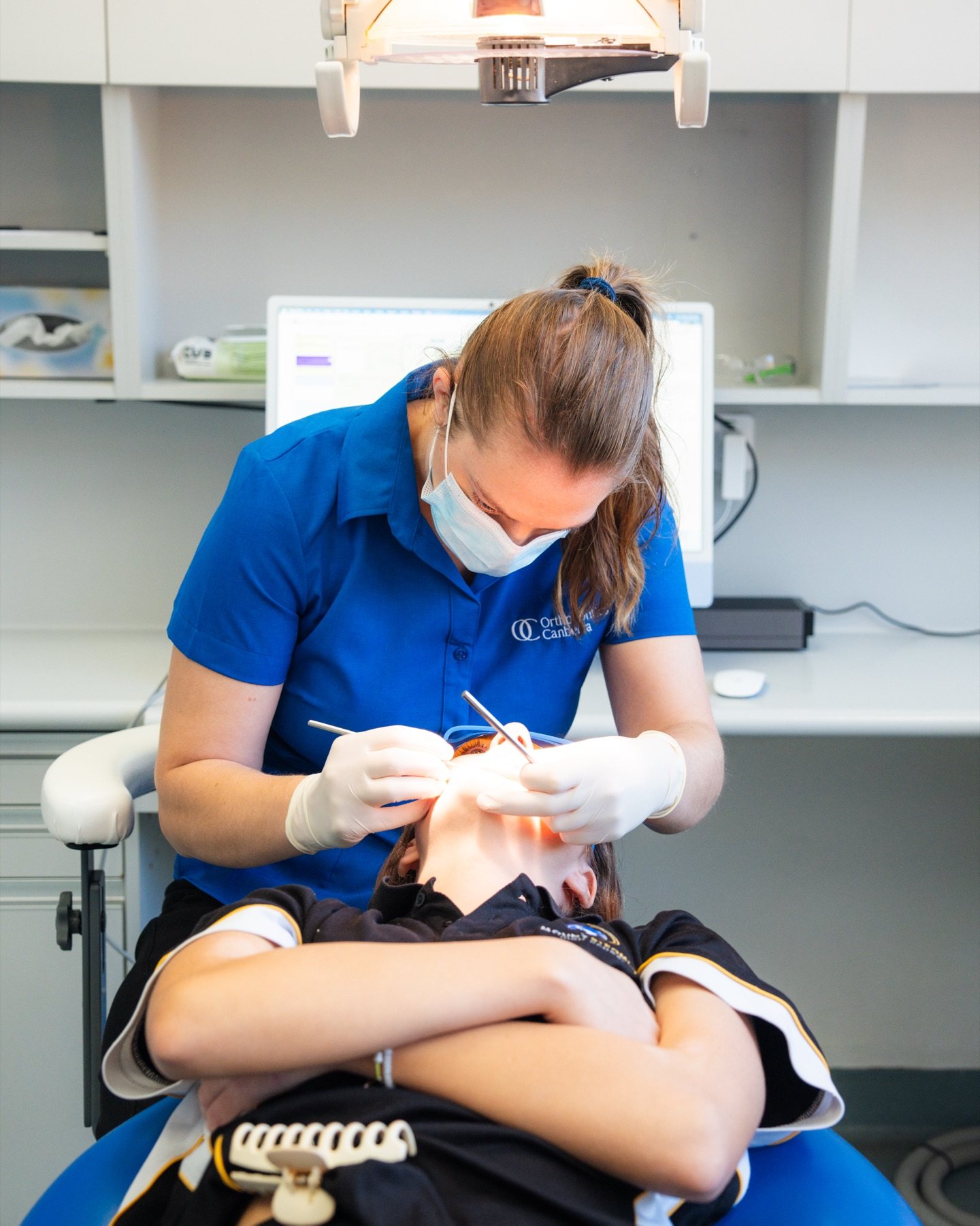 Specialist orthodontic adjustment in progress
